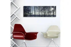 Lerretsbilde med LED-belysning 30x90 cm - Vinterlandskap med snødekte trær og en svak solstråle