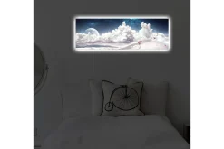 Lerretsbilde med LED-belysning 30x90 cm - Drømmeaktig landskap med en enslig figur som bærer en paraply i et snødekt miljø under en stjerneklar himmel